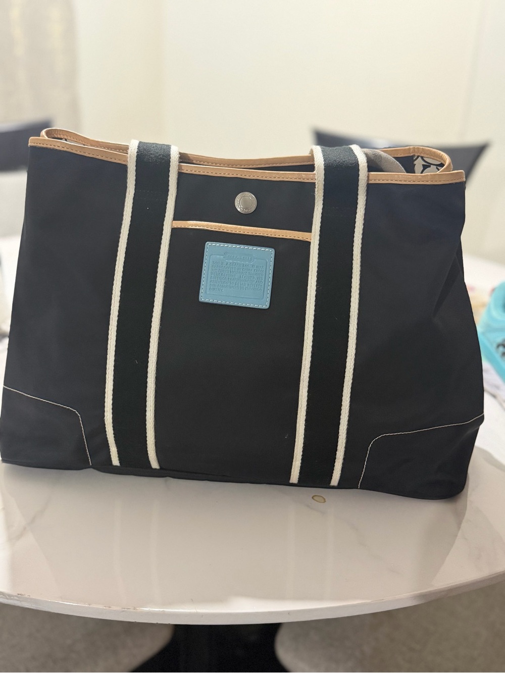 Coach Black Tote with White-Trim Straps and Tan Trim, Blue Patch
